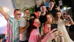 Group of young people taking a selfie
