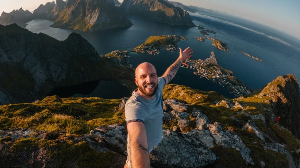 Selfie of a man hiking on a cliff