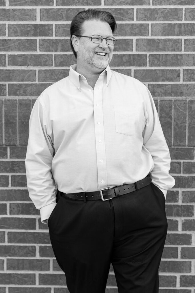 Disability advocate Roy Rickstrew outside his office building, offering approachable, knowledgeable support for Social Security and SSI claimants.